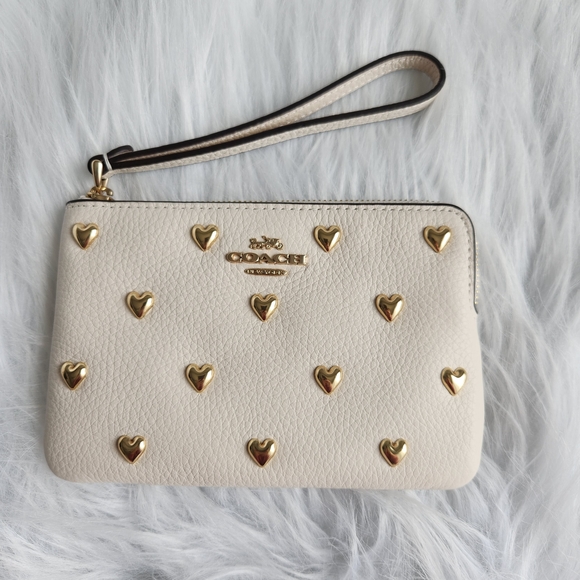 Coach Handbags - Coach Cream Wristlet with Gold Heart Accents